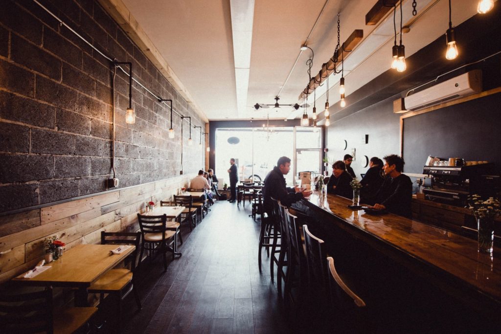 Inside AJ's Kitchen, looking from the rear, restaurant branding